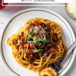 Pinterest graphic showing linguine alla bolognese with a text overlay