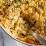 creamy brie mac and cheese in a enamel dutch oven.