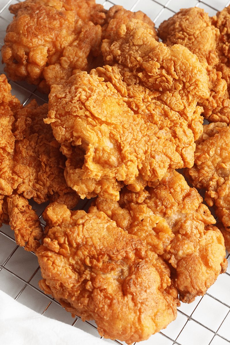 Crispy buttermilk chicken on a wire cooling rack