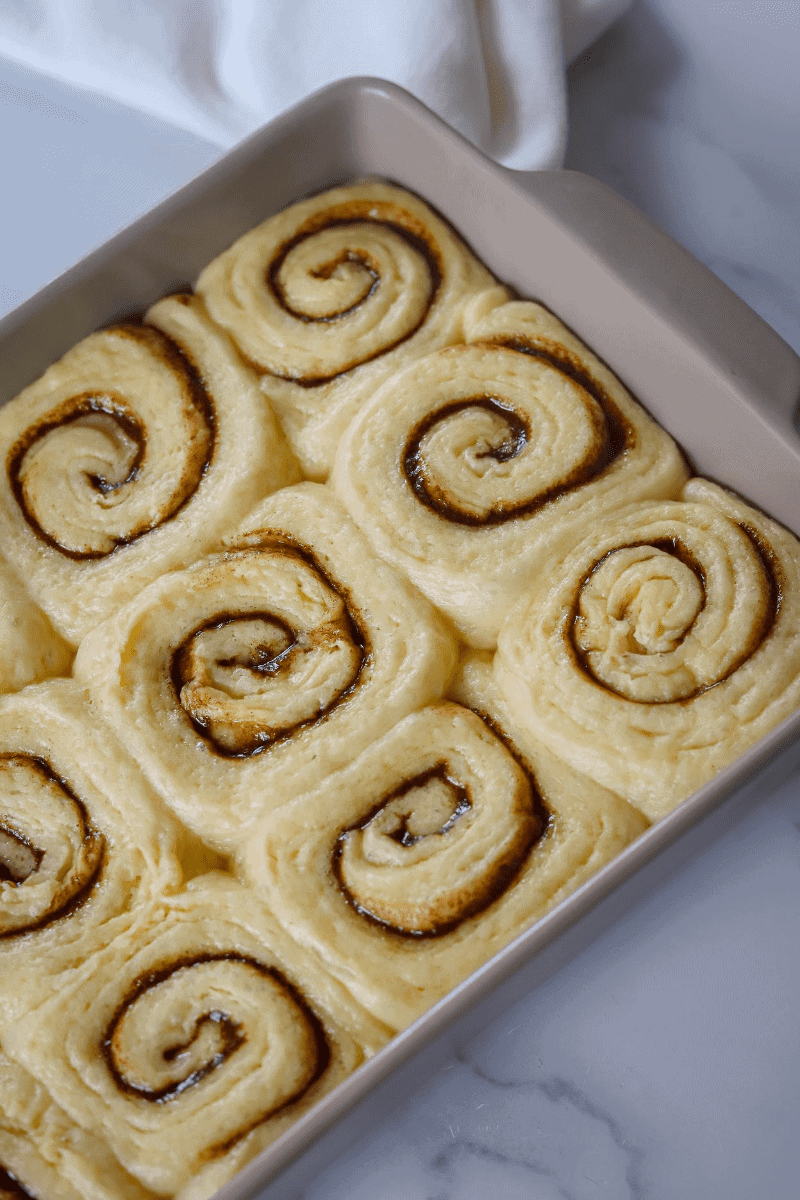 Risen Cinnamon rolls before baking