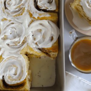 frosted cinnamon rolls soaked in tres leches