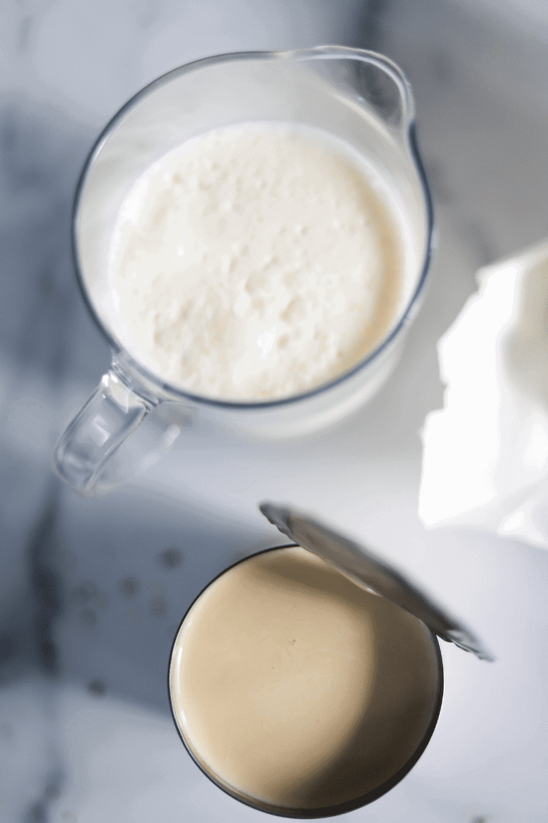 close up photo of heavy cream and evaporated milk
