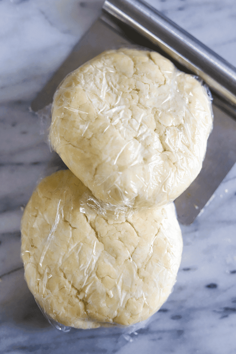 2 plastic-wrapped halves of pastry dough