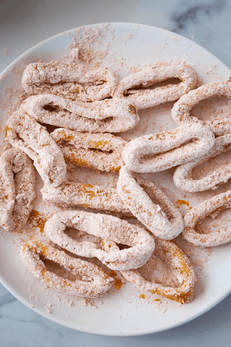 Plate of calamari rings dredged in flour