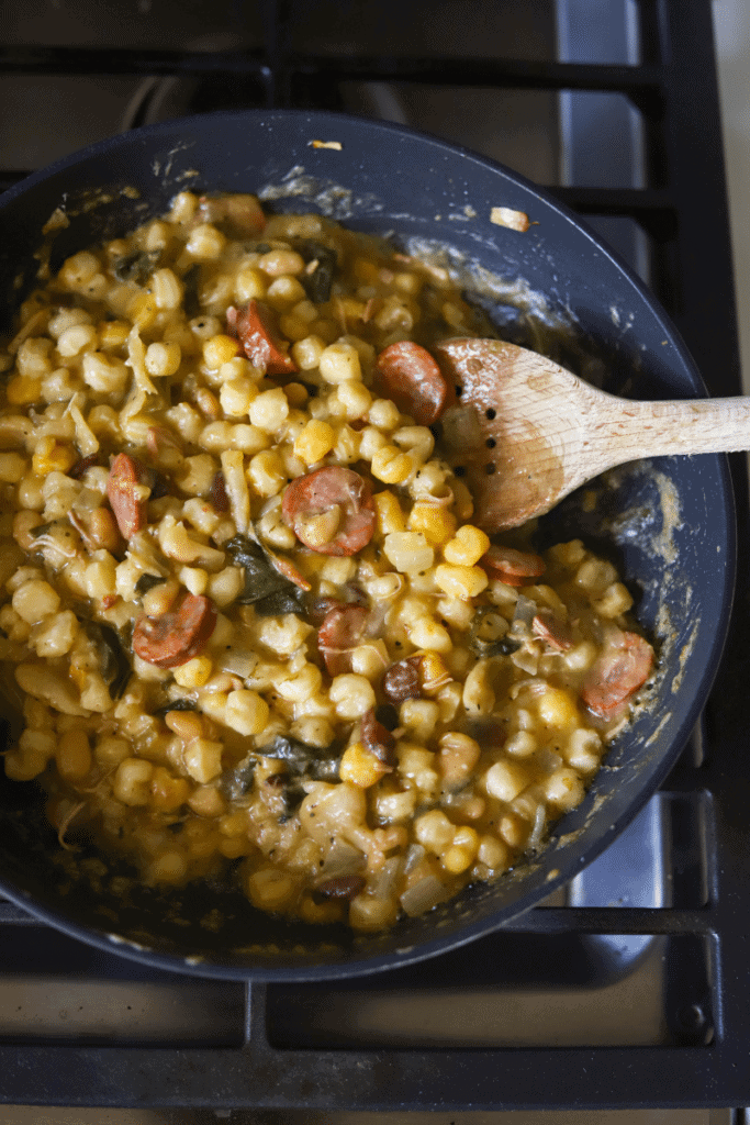 cachupa guisado (refogado) in a non-stick skillet Purpose of photo is to show the user how to re-heat and fry cachupa for breakfast