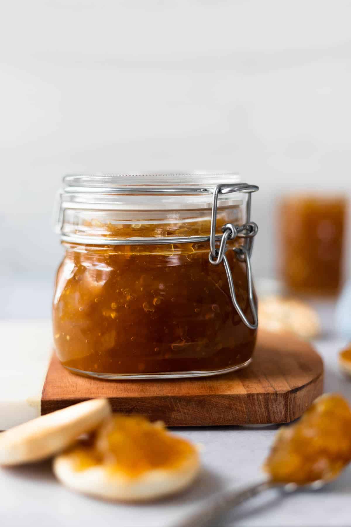 green papaya jam in a mason jar with the lid on