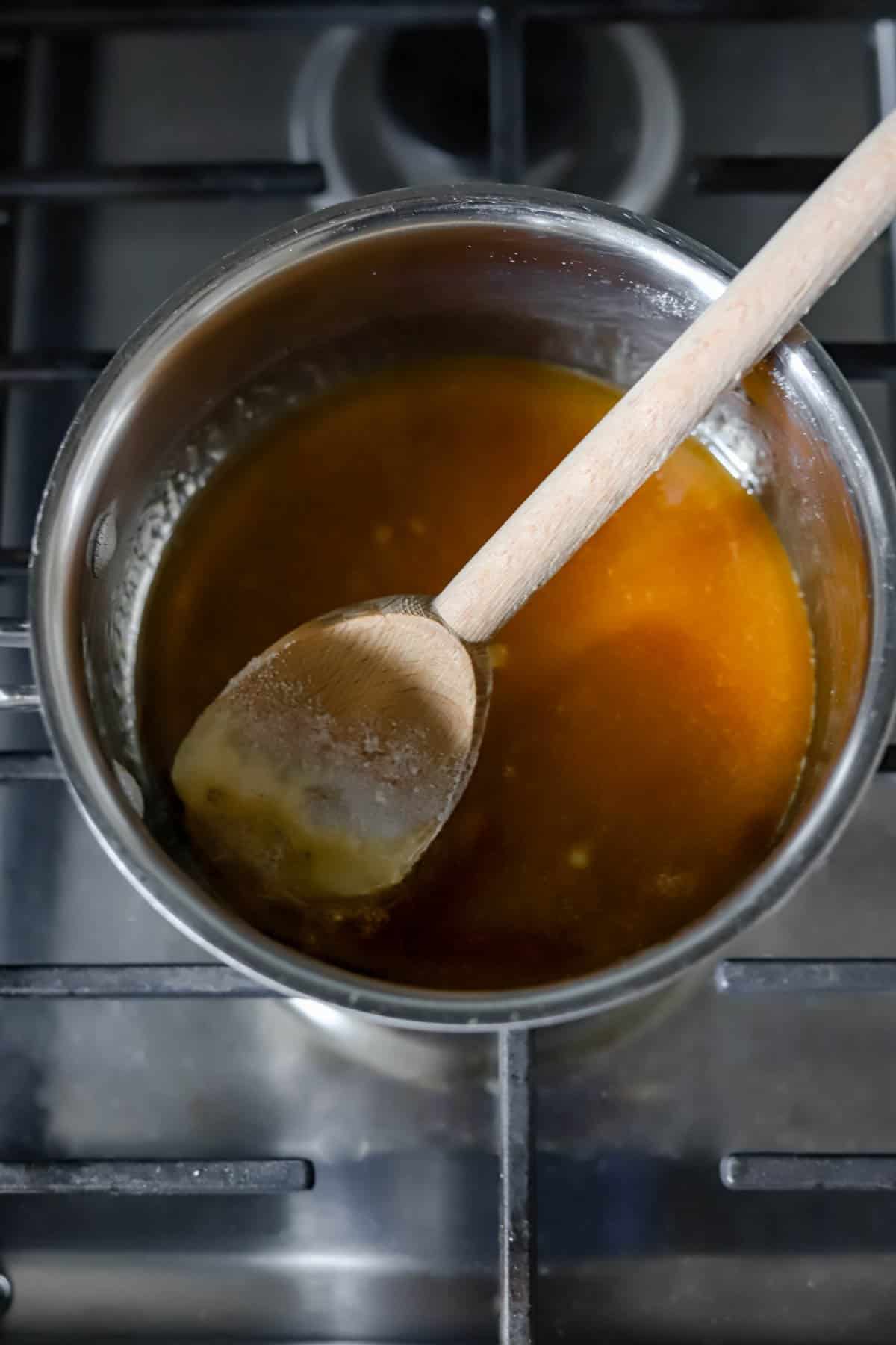 recipe process shot of caramelized sugar for green papaya jam