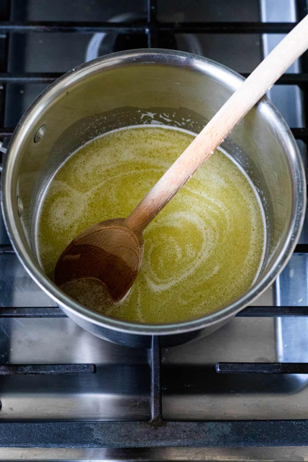 melted butter, water, vanilla, salt and sugar mixture in pan