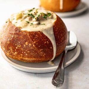 creamy New England style clam chowder served in a bread bowl