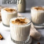 pinterest graphic for mexican agua de horchata. 3 glasses of horchata with a text overlay