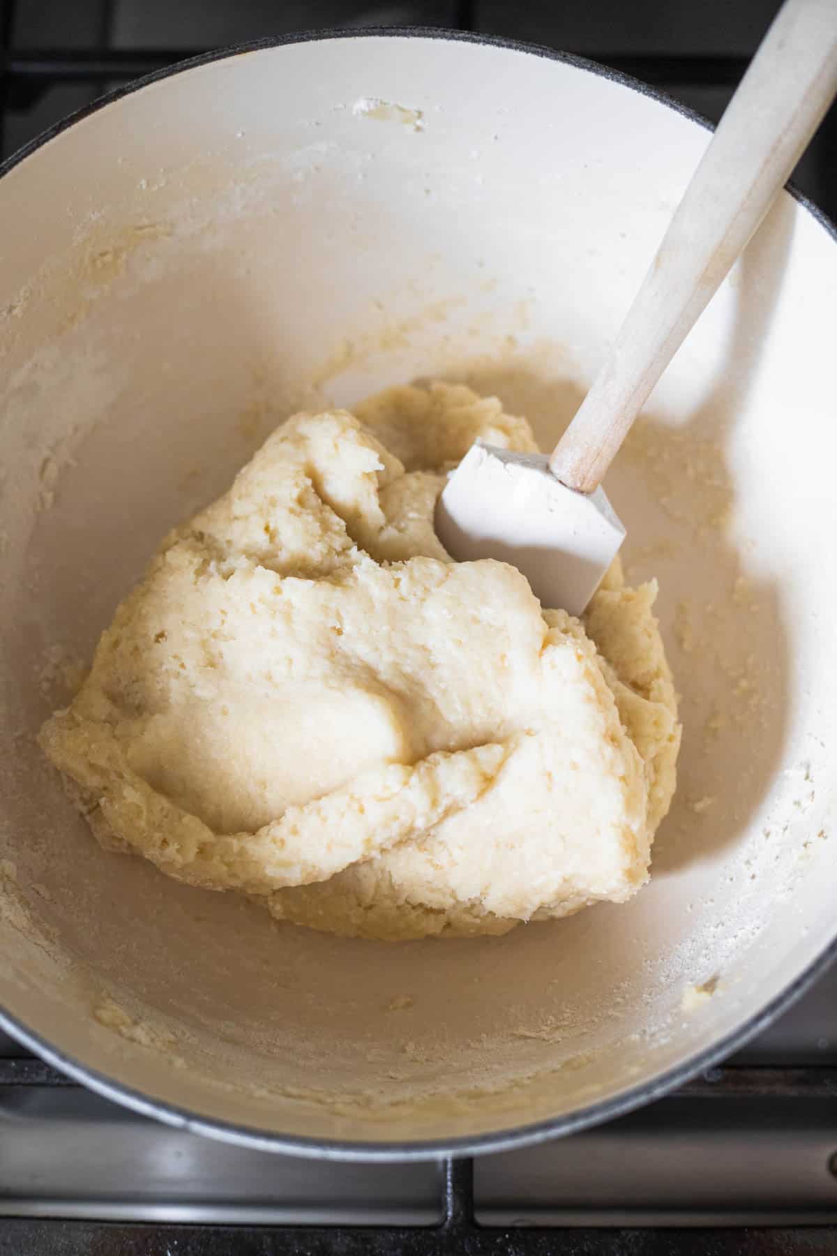 cooked dough for rissois in a pan on the stovetop