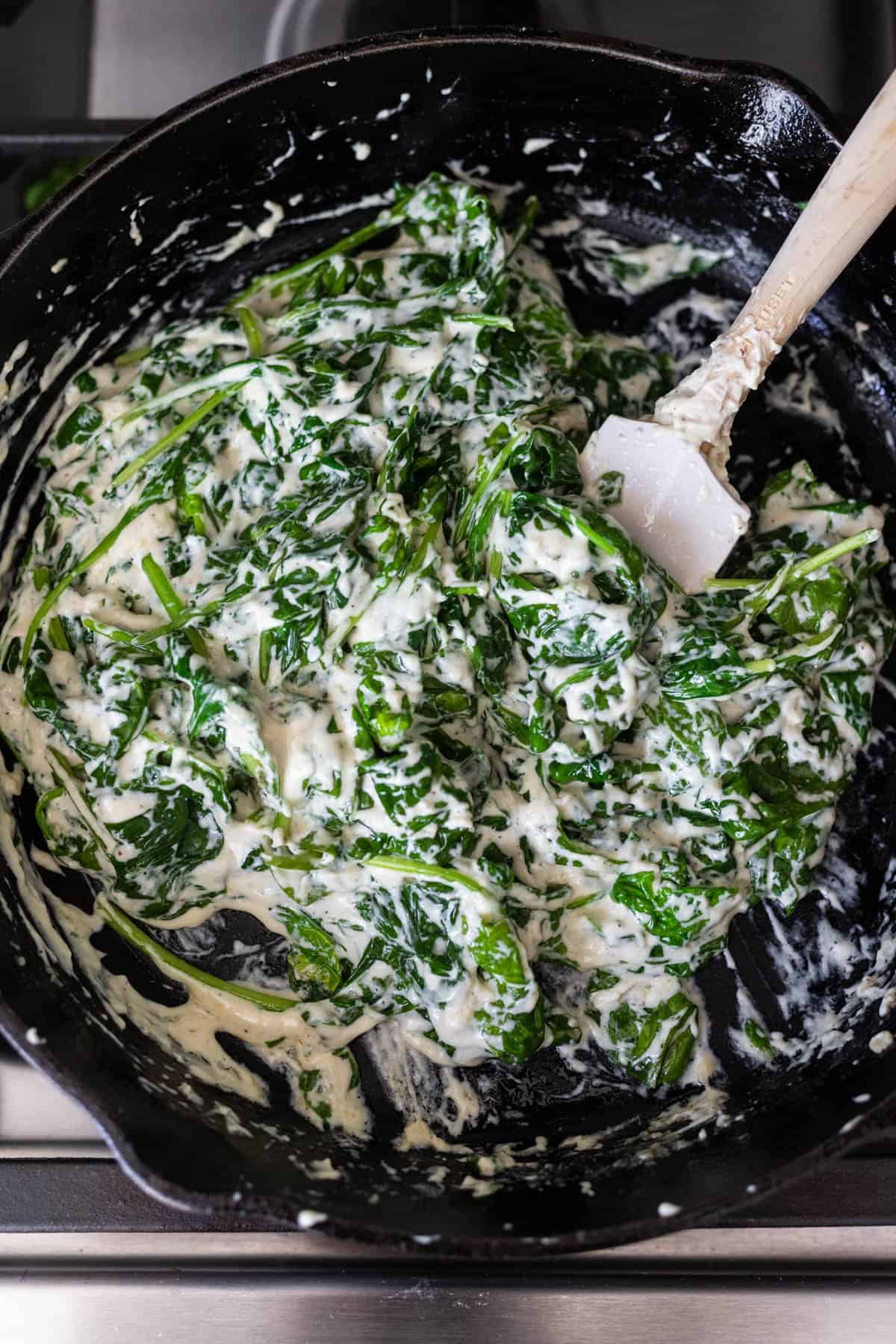 spinach added to crab artichoke dip