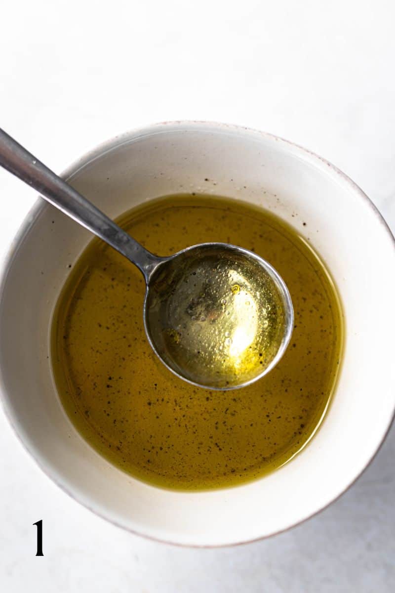oil and vinegar dressing in a bowl.
