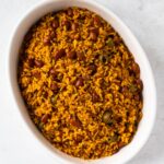 Dominican moro rice and beans in an oval dish.